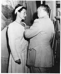 Virginia Hall receiving the Distinguished Service Cross from President Truman
