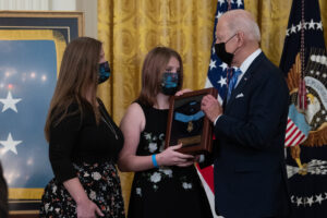 The Family of Christopher Celiz receive the Medal of Honor from President Biden in a ceremony at the White House