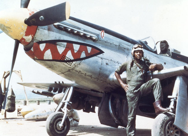 Tuskegee Airman pictured in front of his aircraft